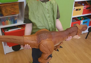 Jacek jako dinozaur.
